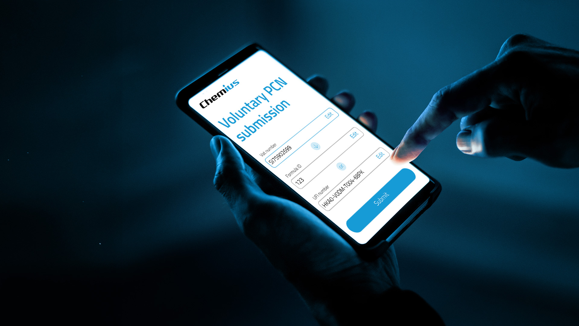A person holding a smartphone in one hand and using the other hand to tap the “Submit” button on a mobile screen displaying a “Voluntary PCN submission” form from Chemius, with fields for VAT number, Formula ID, and UFI number, against a dark blue background